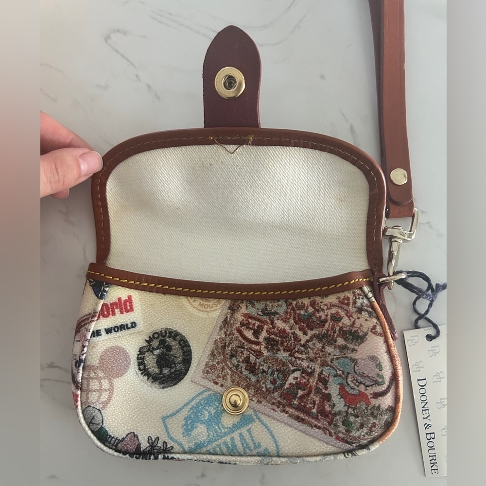 Dooney & Bourke Disney Parks Wristlet -Vintage Postcard Magic Kingdom Print- NWT - Picture 7 of 11